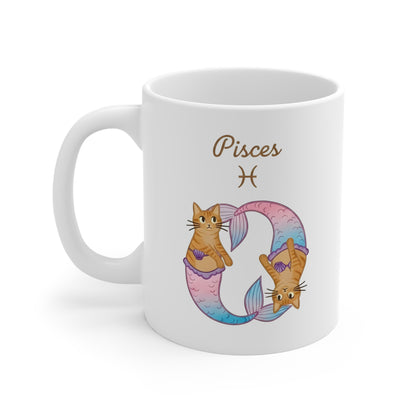 White 11oz ceramic mug featuring two Pisces mermaid cats and the sign.
